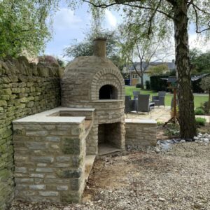 charming outdoor kitchen NN13, outdoor kitchen, wood fired oven, pizza oven, cotswold stone, outdoor cooking, brick oven,
